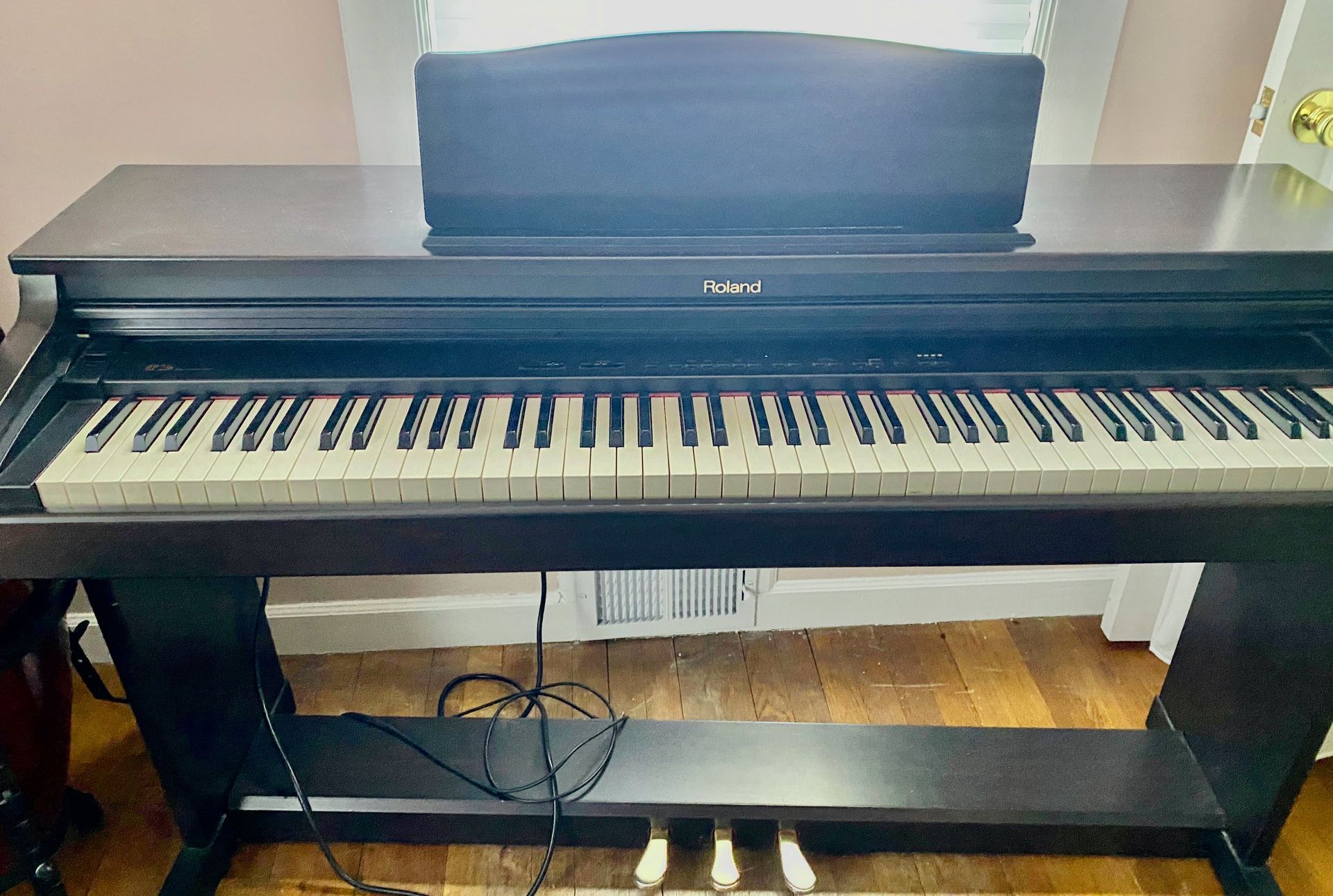 Piano with a bench