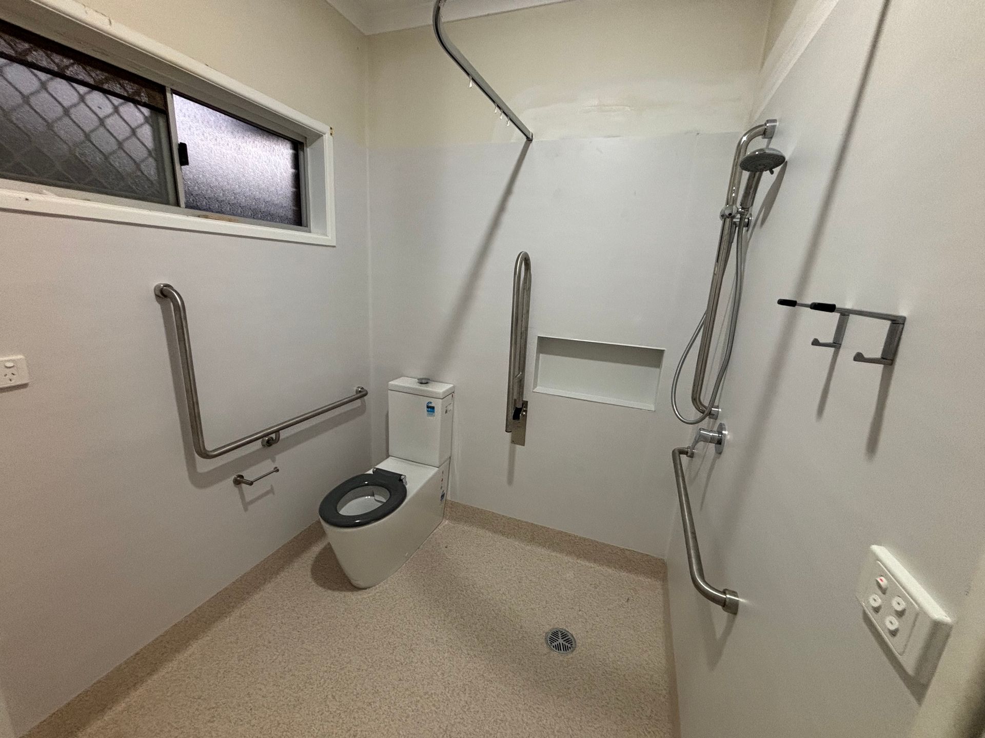 Accessible bathroom with grab bars — Truflow Plumbing & Gas Solutions in Rockhampton City, QLD