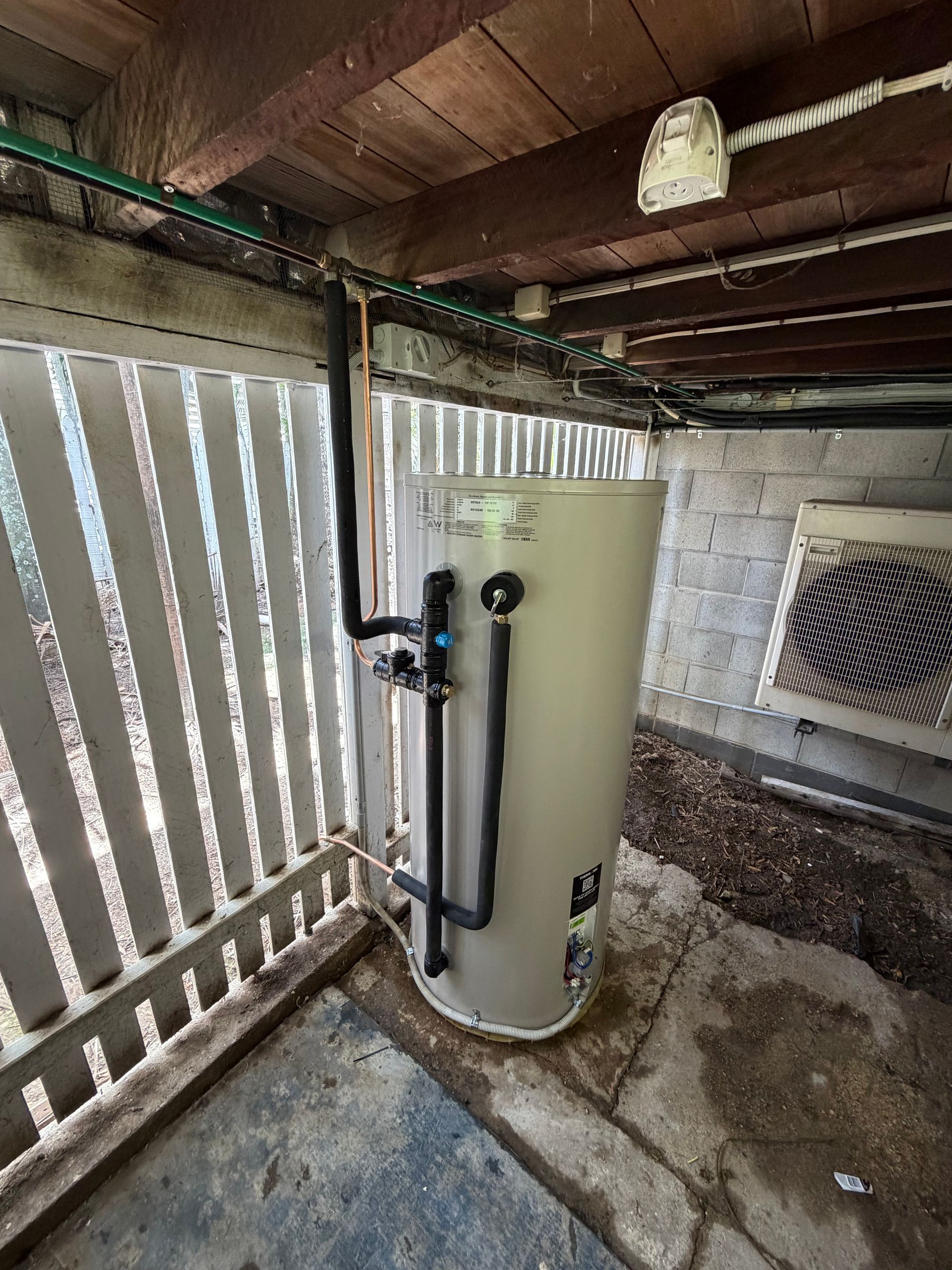 Water heater in a small shed — Truflow Plumbing & Gas Solutions in Rockhampton City, QLD
