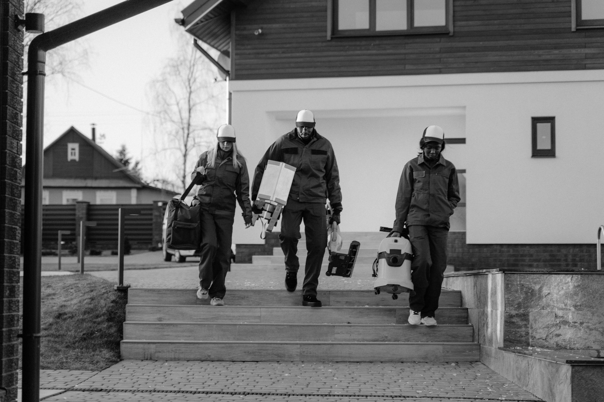 Professional cleaning crew with equipment arriving at worksite