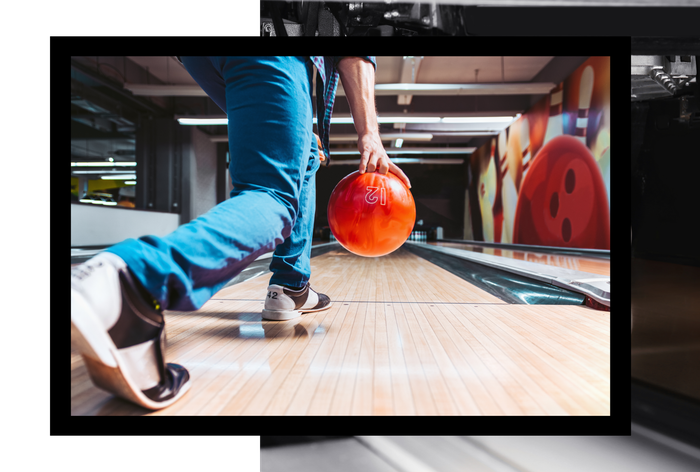 Man throwing bowling ball
