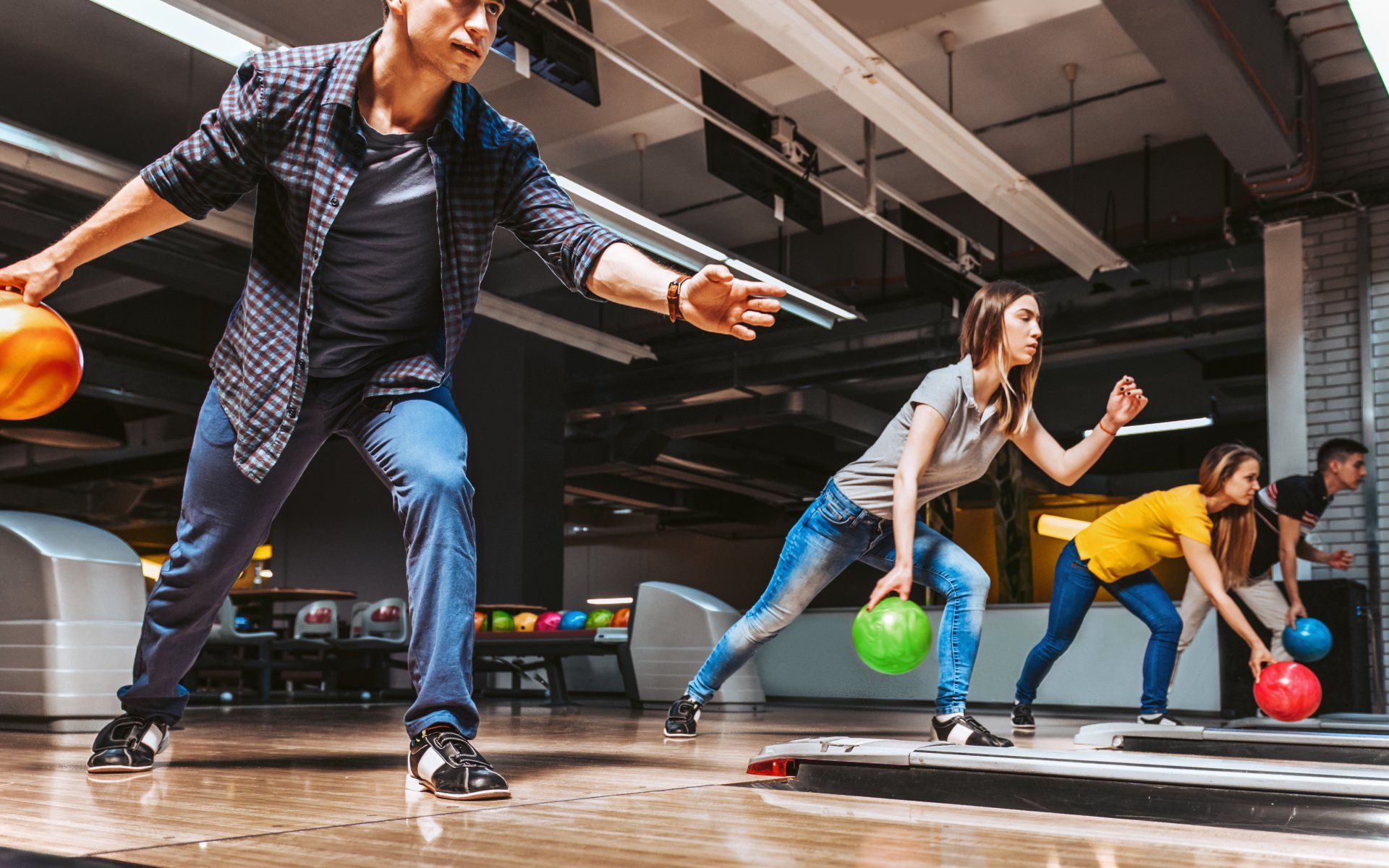 friend having fun bowling