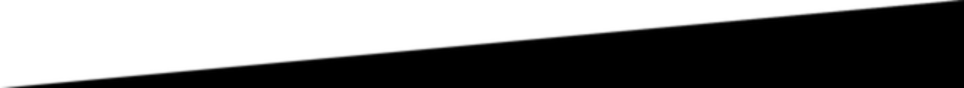 A close up of a yellow triangle on a white background.