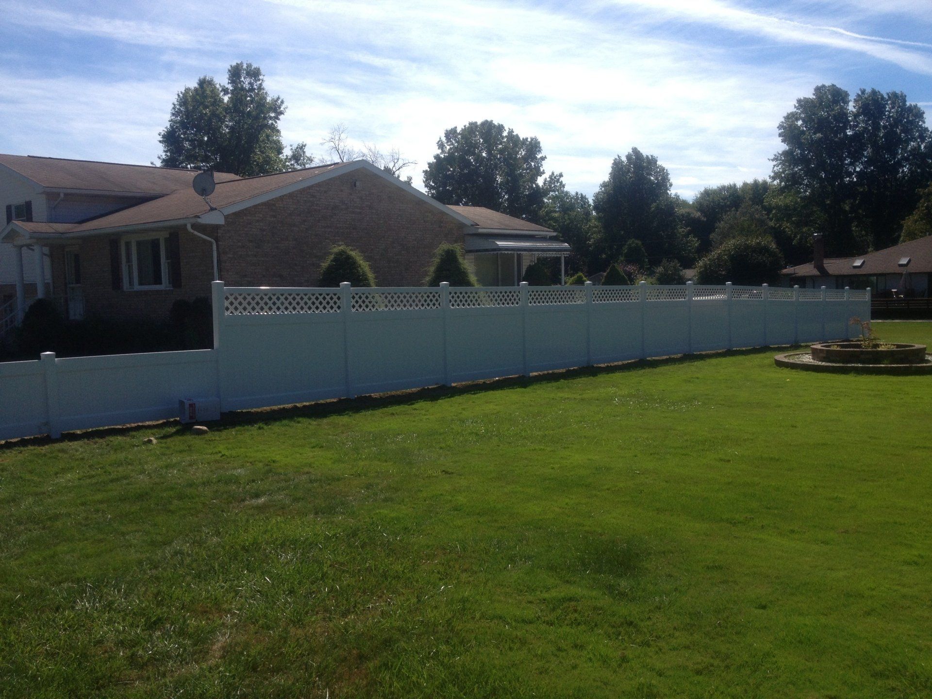 Privacy vinyl lattice fence installed by Metal Fence Supply Co.