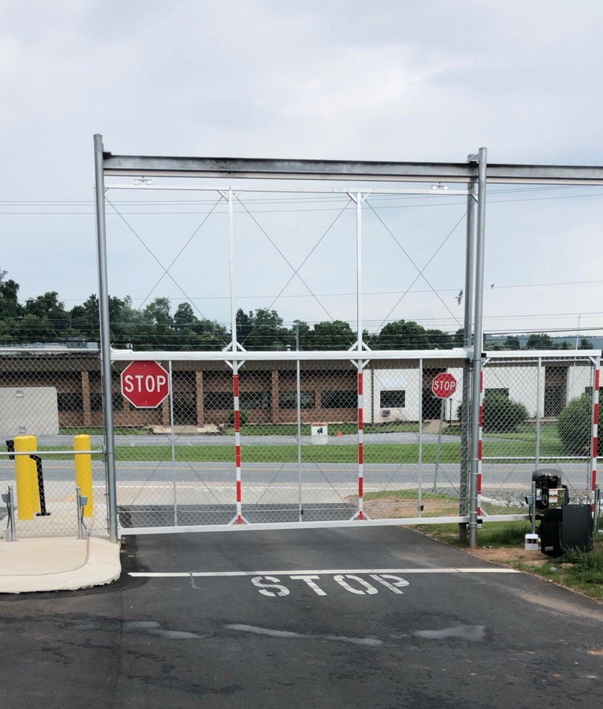Access control and security gate installed by Metal Fence Supply Co.