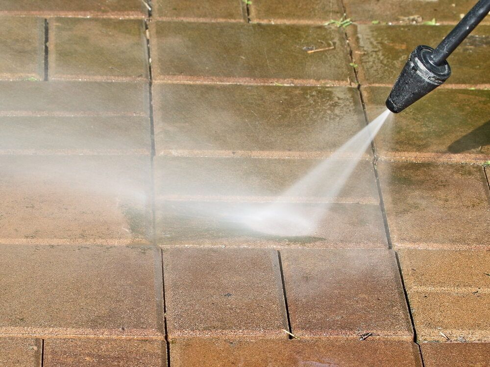 Pressure washing bricks