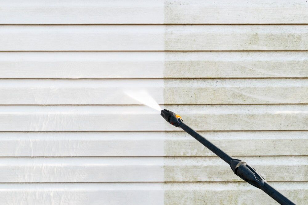 Pressure washing house exterior