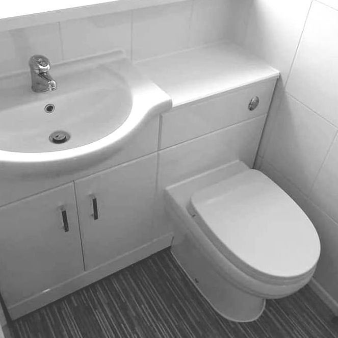 Cloakroom Plumbing photo of a bathroom with a sink and toilet.