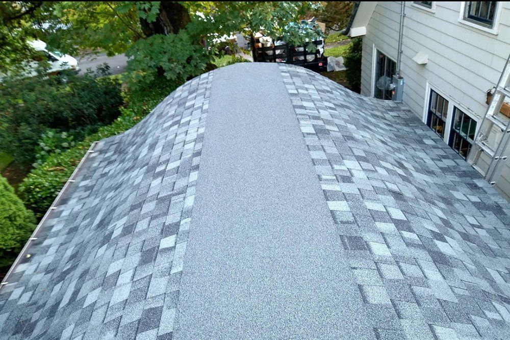 Silver Color Shingle Roof — Vancouver, WA — Mountainside Roofing LLC Silver Color Shingle Roof — Vancouver, WA — Mountainside Roofing LLC