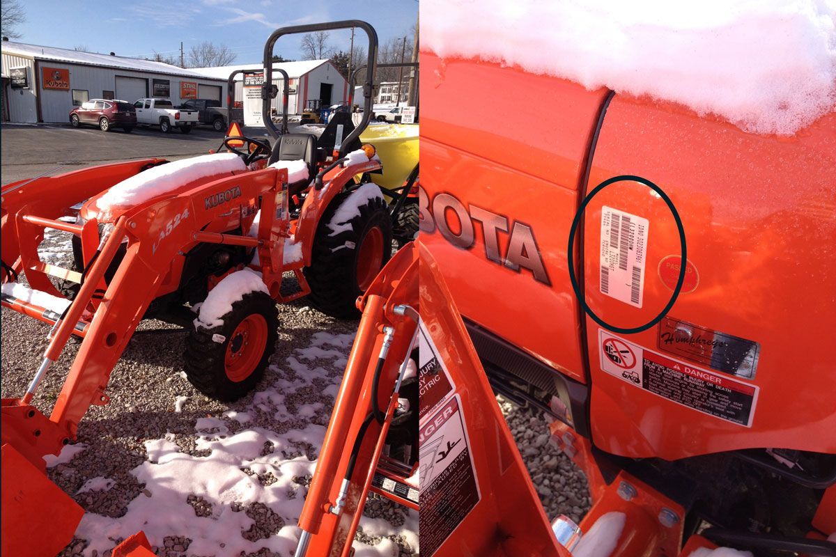 Orange Kubota tractor in snowy outdoor setting; close-up shows identification sticker on side.