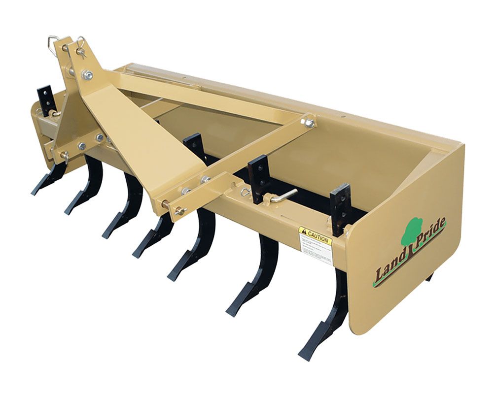 Tan Land Pride box blade with black tines, used for leveling and grading soil.