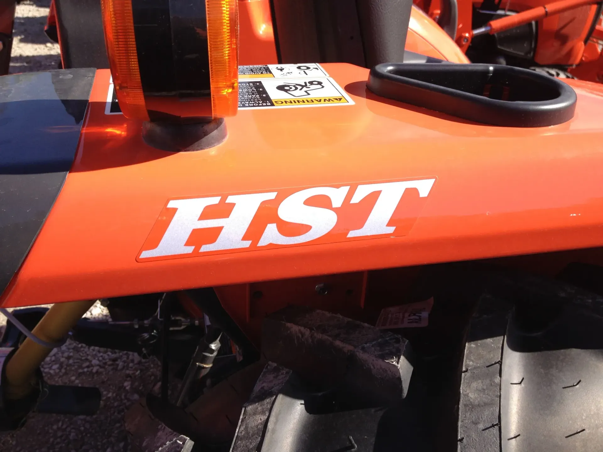 Orange tractor hood with 