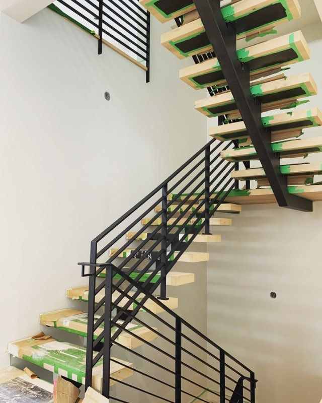 metal mono stringer staircase under construction