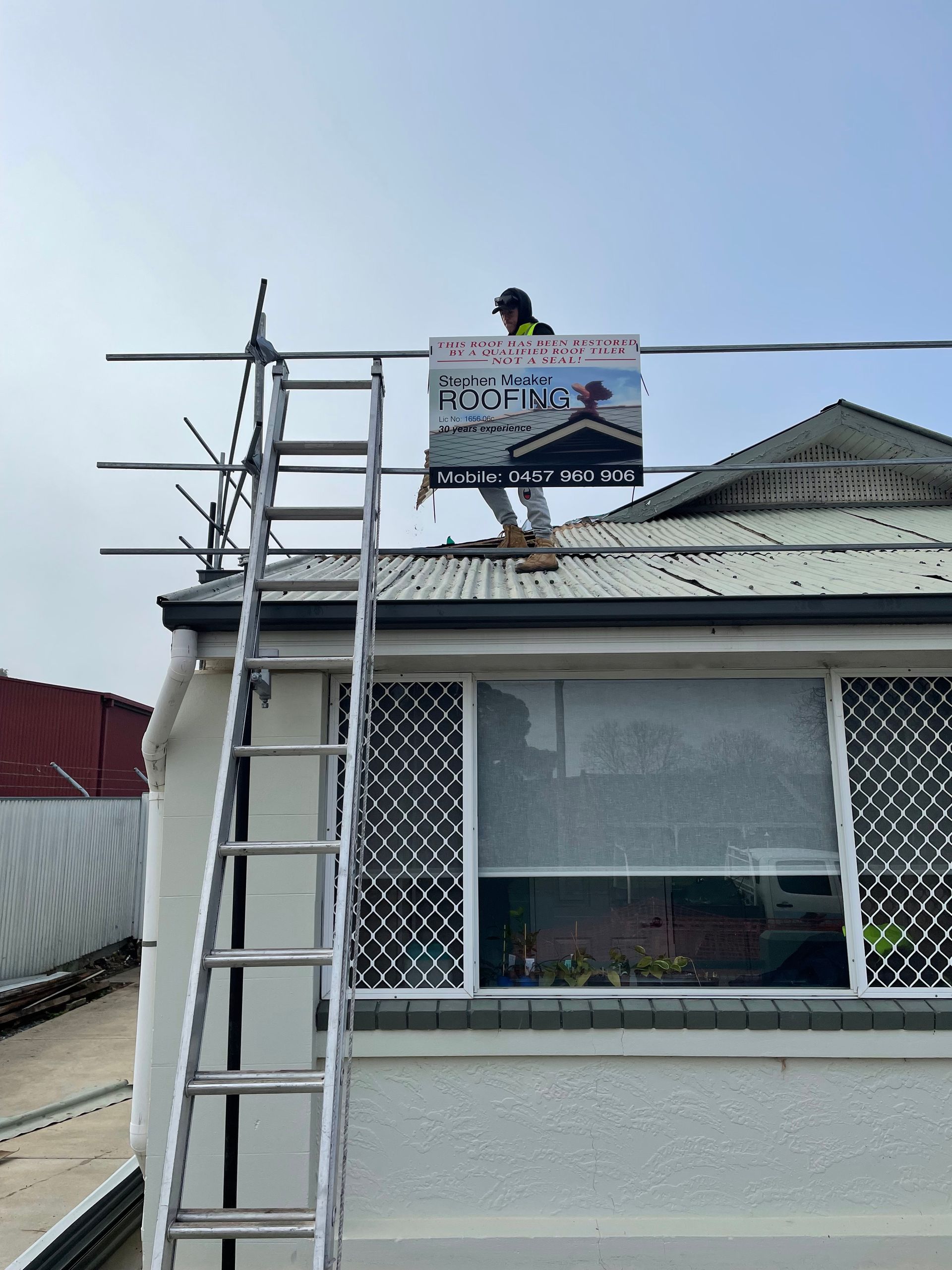 The roof of a house with solar panels on it — Stephen Meaker Roofing in Wagga Wagga, NSW