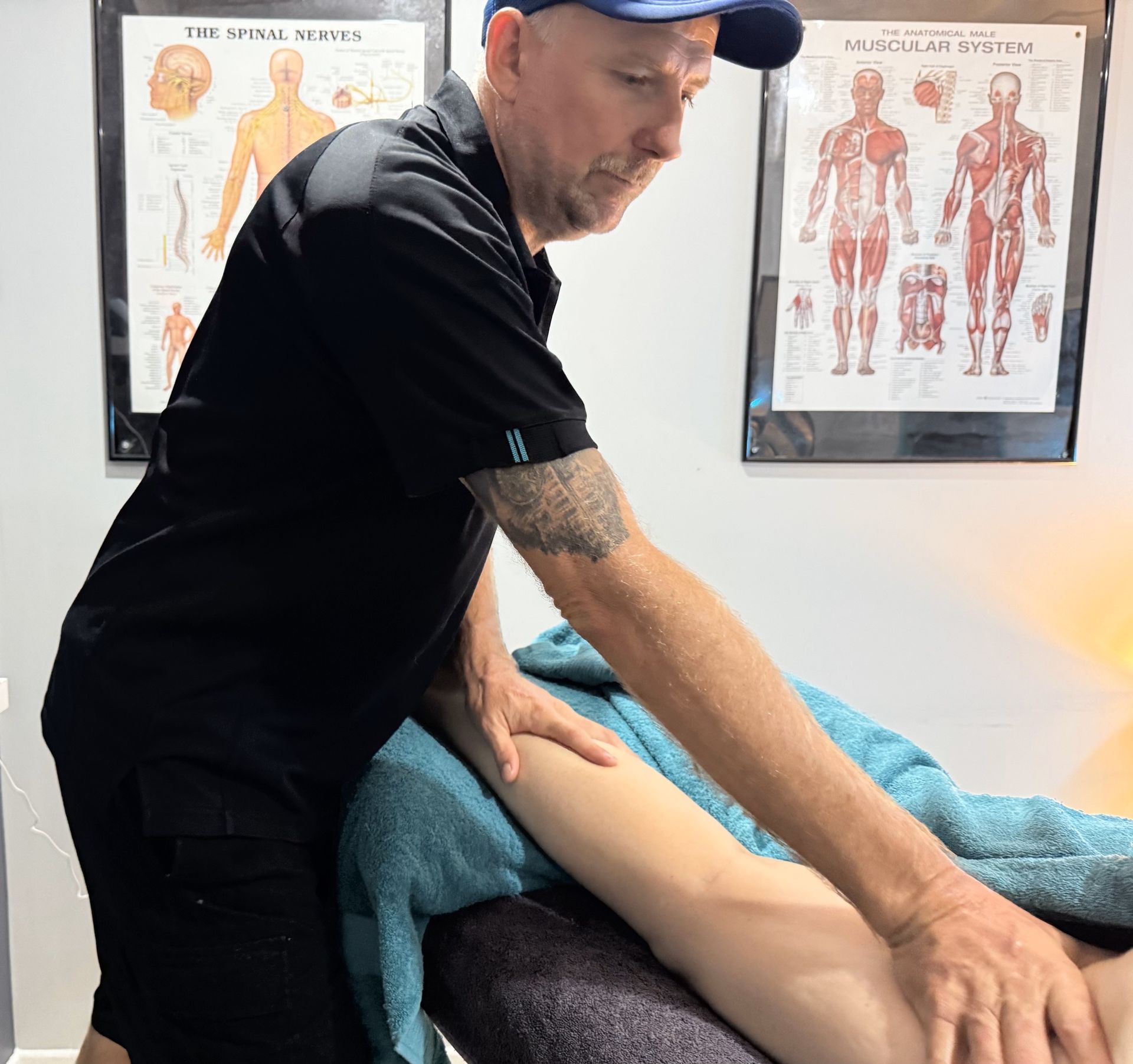 A Man Is Getting A Massage At A Spa — Pin Point Remedial Massage In Lammermoor, QLD