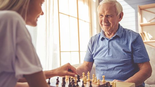 two people playing chess