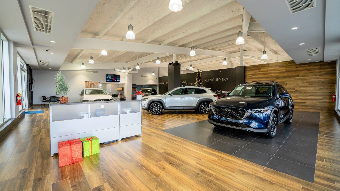 Flagship Mazda, Jeep & Chrysler dealership showroom's front desk.