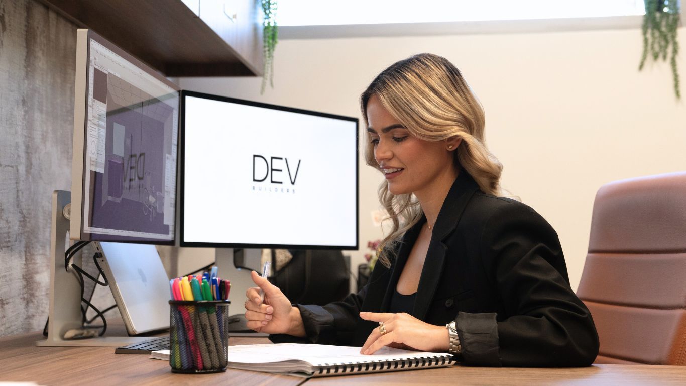 DEV Builders executive working in project management