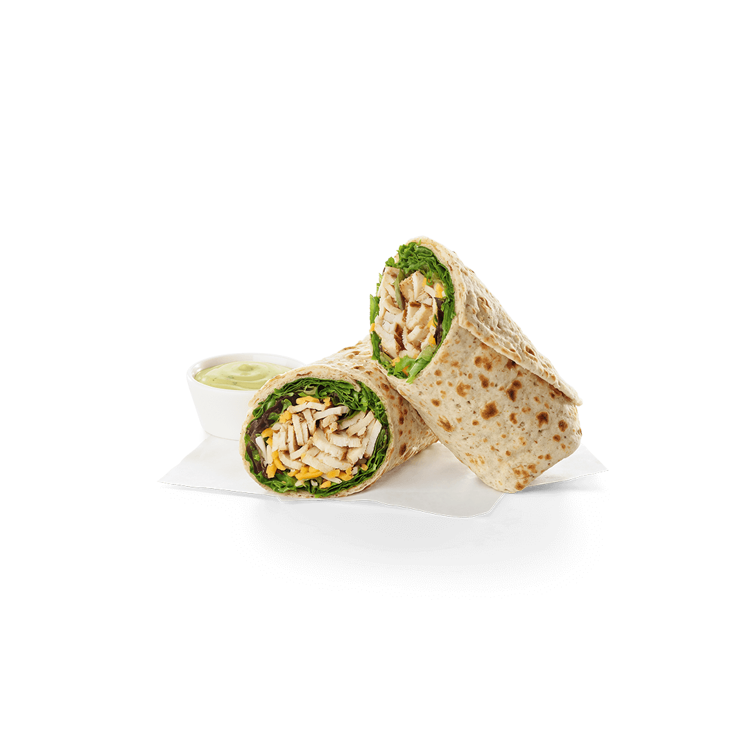 A chicken wrap with a side of ranch dressing on a white surface. A Chick fil A Macro healthier options