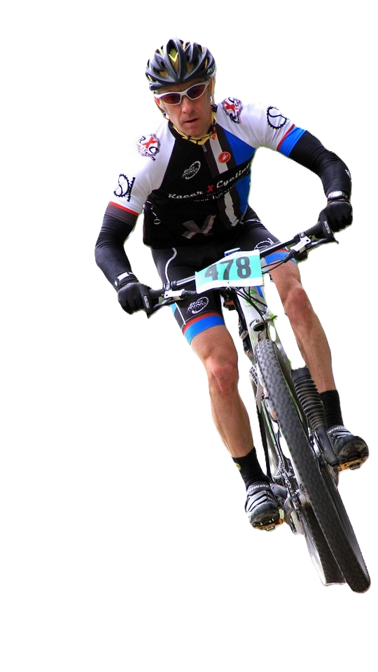 Cyclist in black and white racing gear riding a mountain bike against a white background