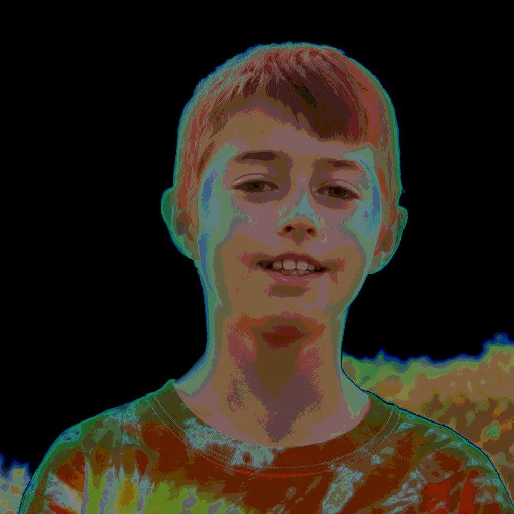 Max, wearing a tie-dye shirt. Psychedelic color effect.