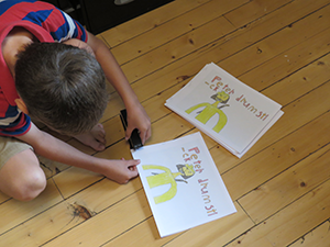 Max preparing merch.