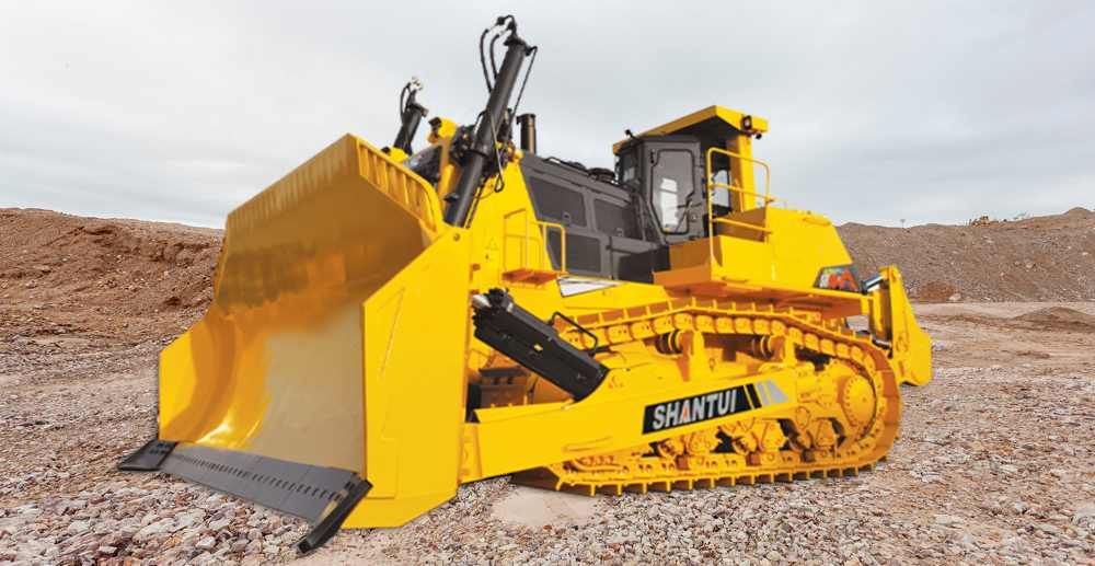 A Yellow Bulldozer is Parked in a Dirt Field — Rowdraulics NQ Pty Ltd in Mount Louisa, QLD