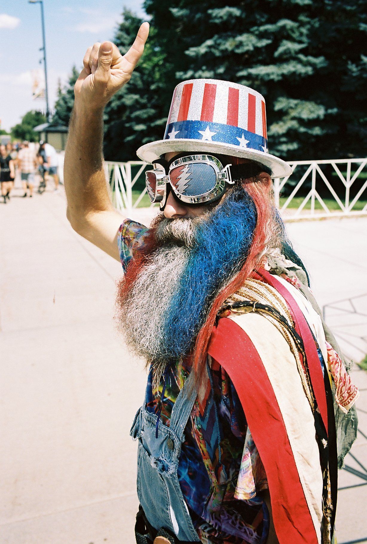A man with a beard is dressed as uncle sam