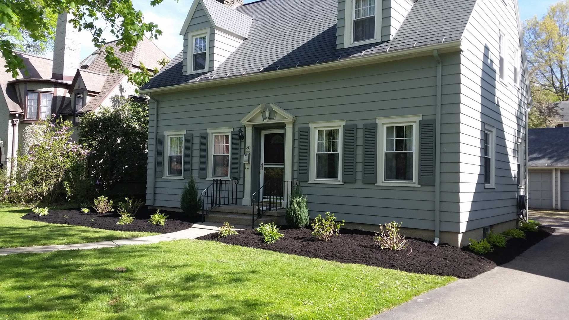 front right of gray house with landscaping