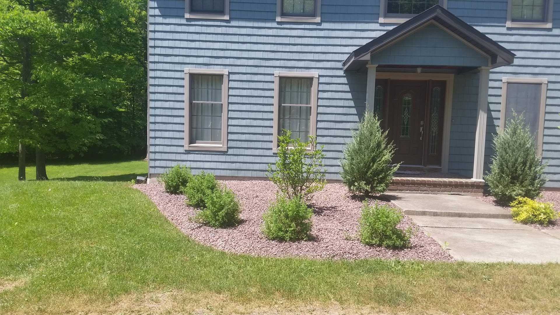 front left side of house with landscaping