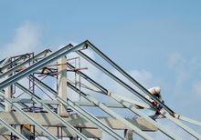 workers building the house
