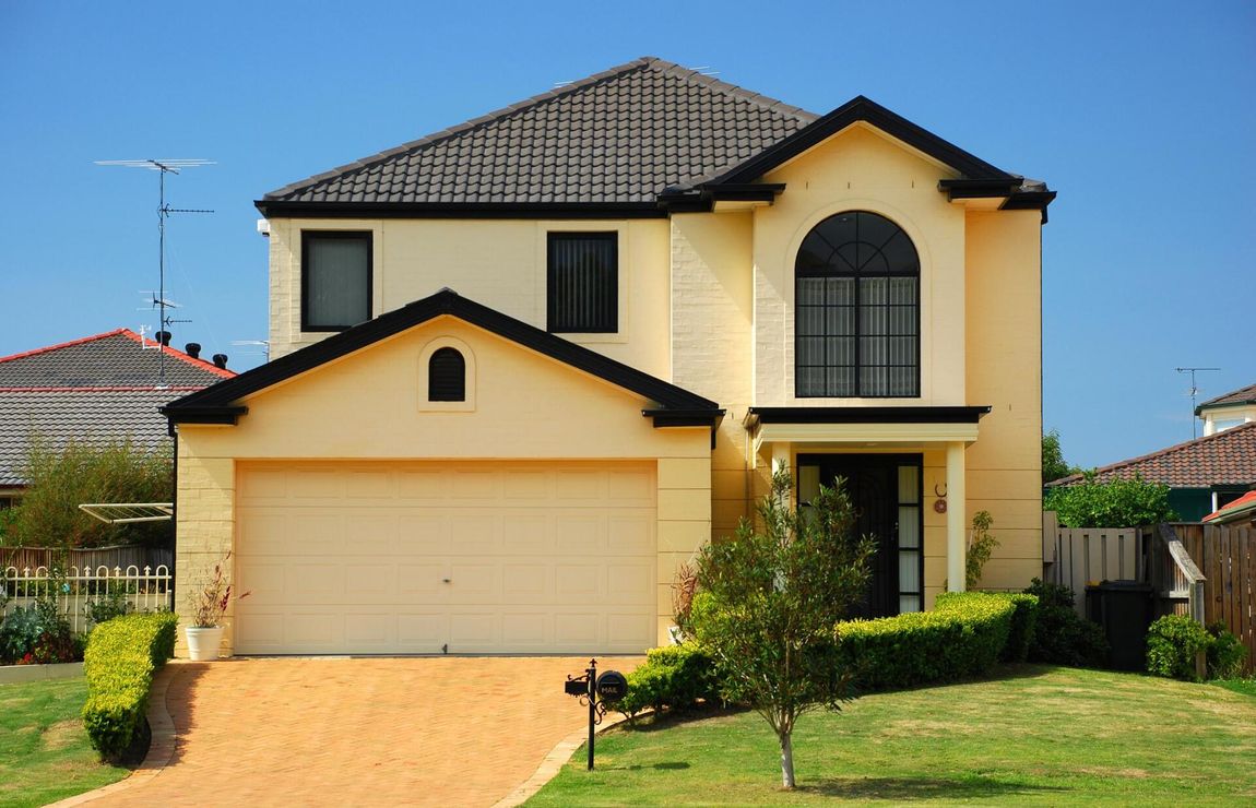 house with concrete driveway