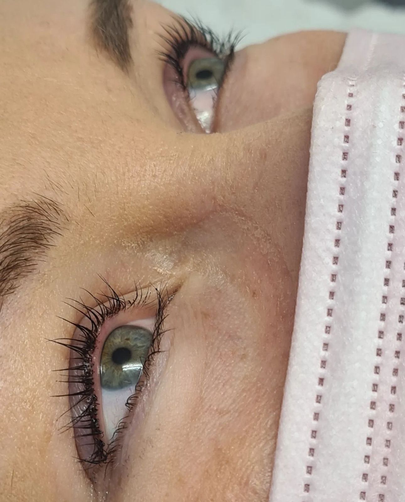 A close up of a woman who has just had her lashes done at panache hair and beauty salon