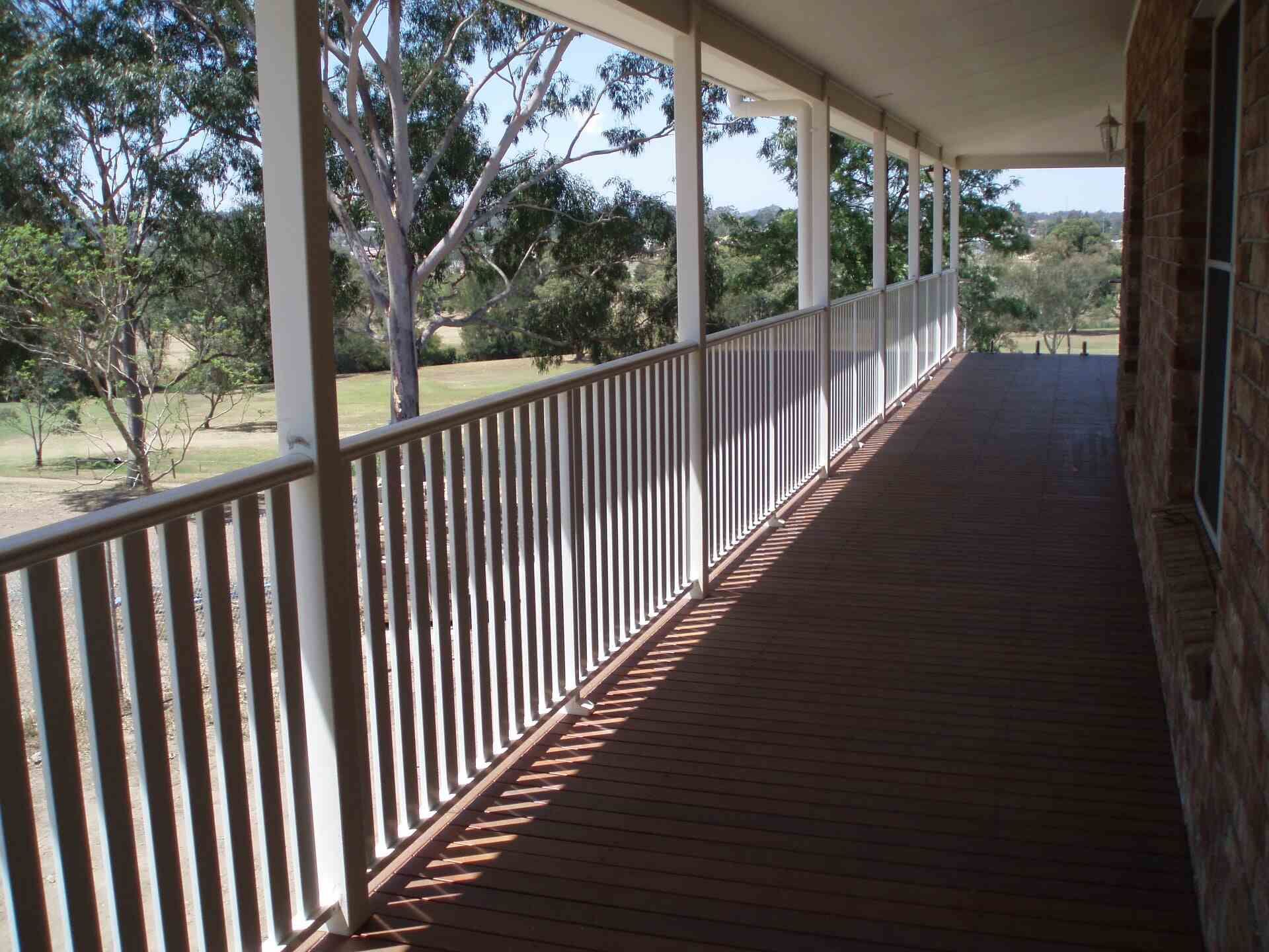 Aluminium Slat Fencing Newcastle Along A Spacious Outdoor Deck — Aluminium Manufacturer in Newcastle, NSW