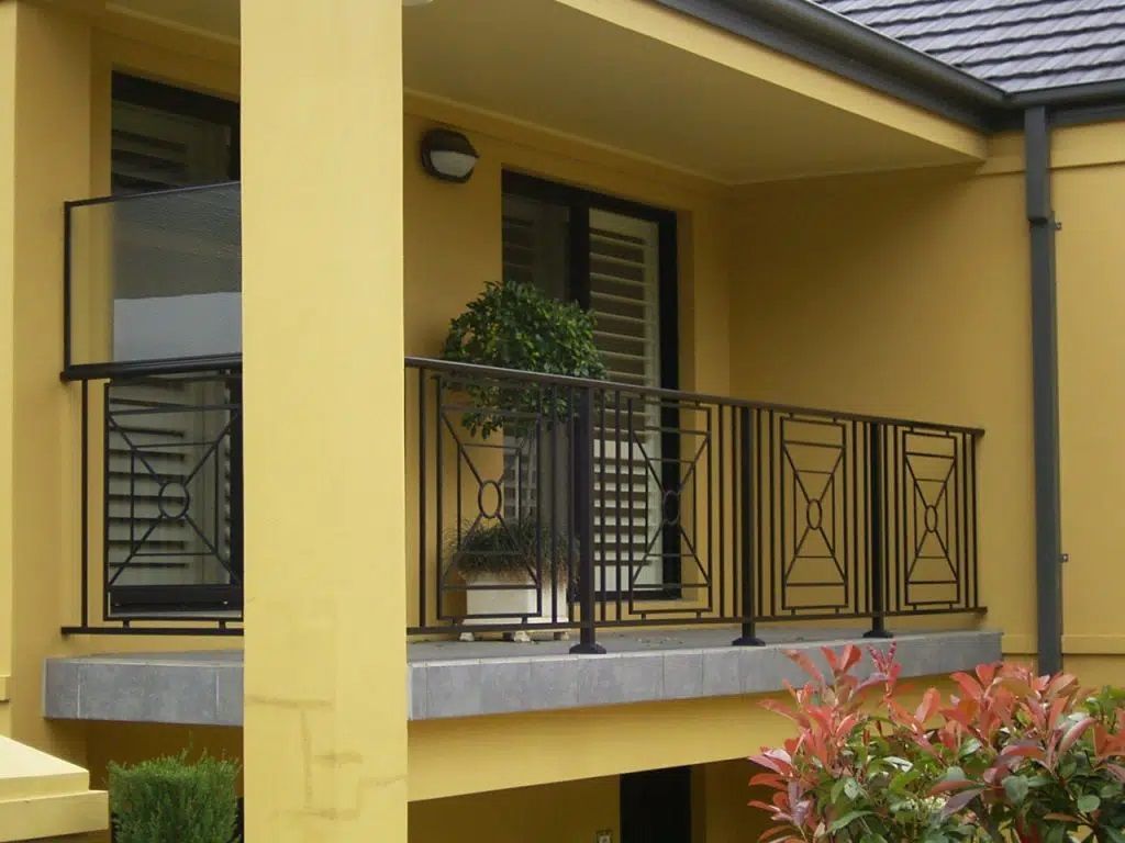 Balcony With Railings On A Yellow House - Balustrades Newcastle, NSW