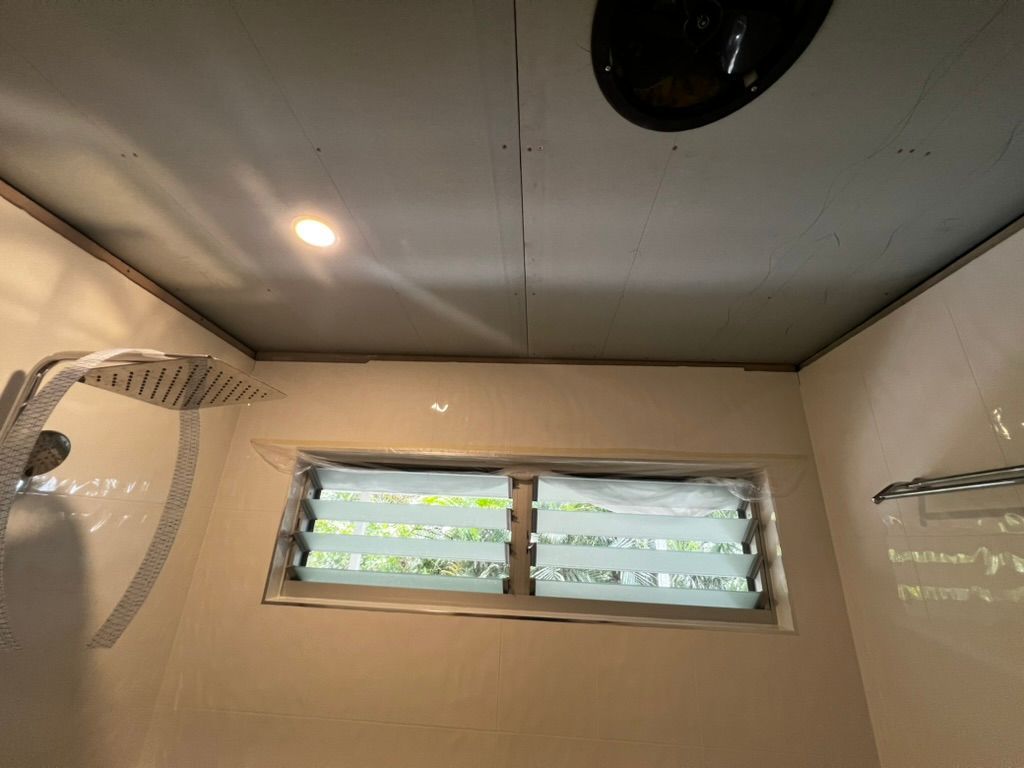 A Room That is Being Remodeled With a Sliding Glass Door — Poljak Plasterers in Rosslea, QLD