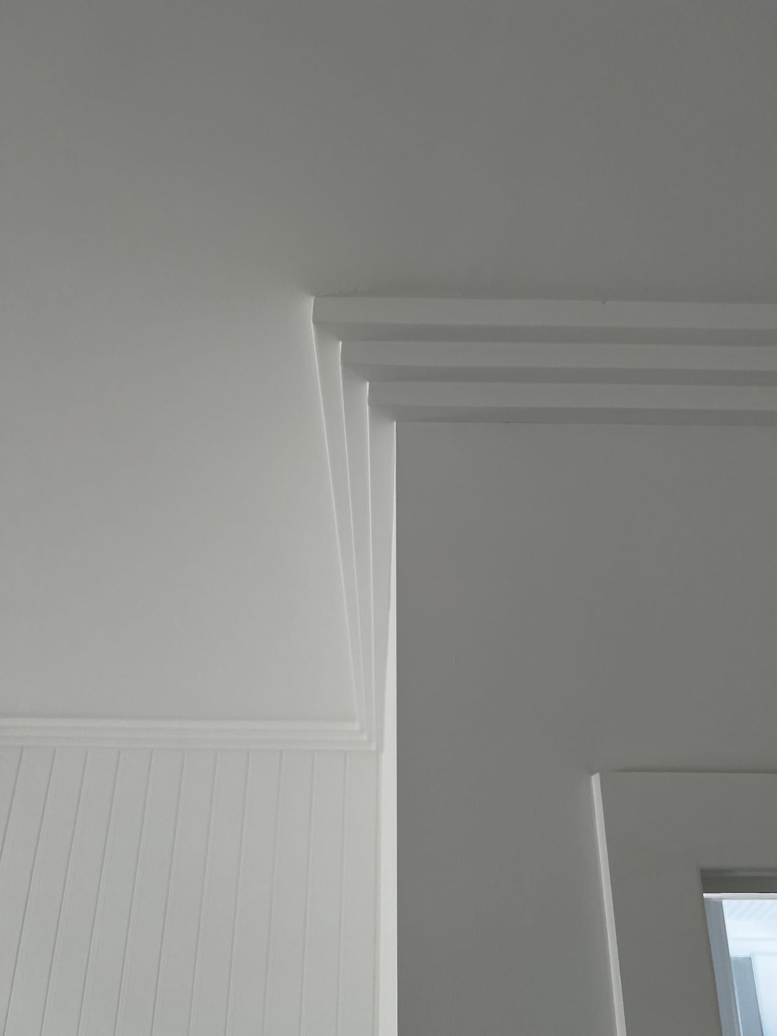 A Close Up of a White Ceiling in a Room With a Window — Poljak Plasterers in Rosslea, QLD