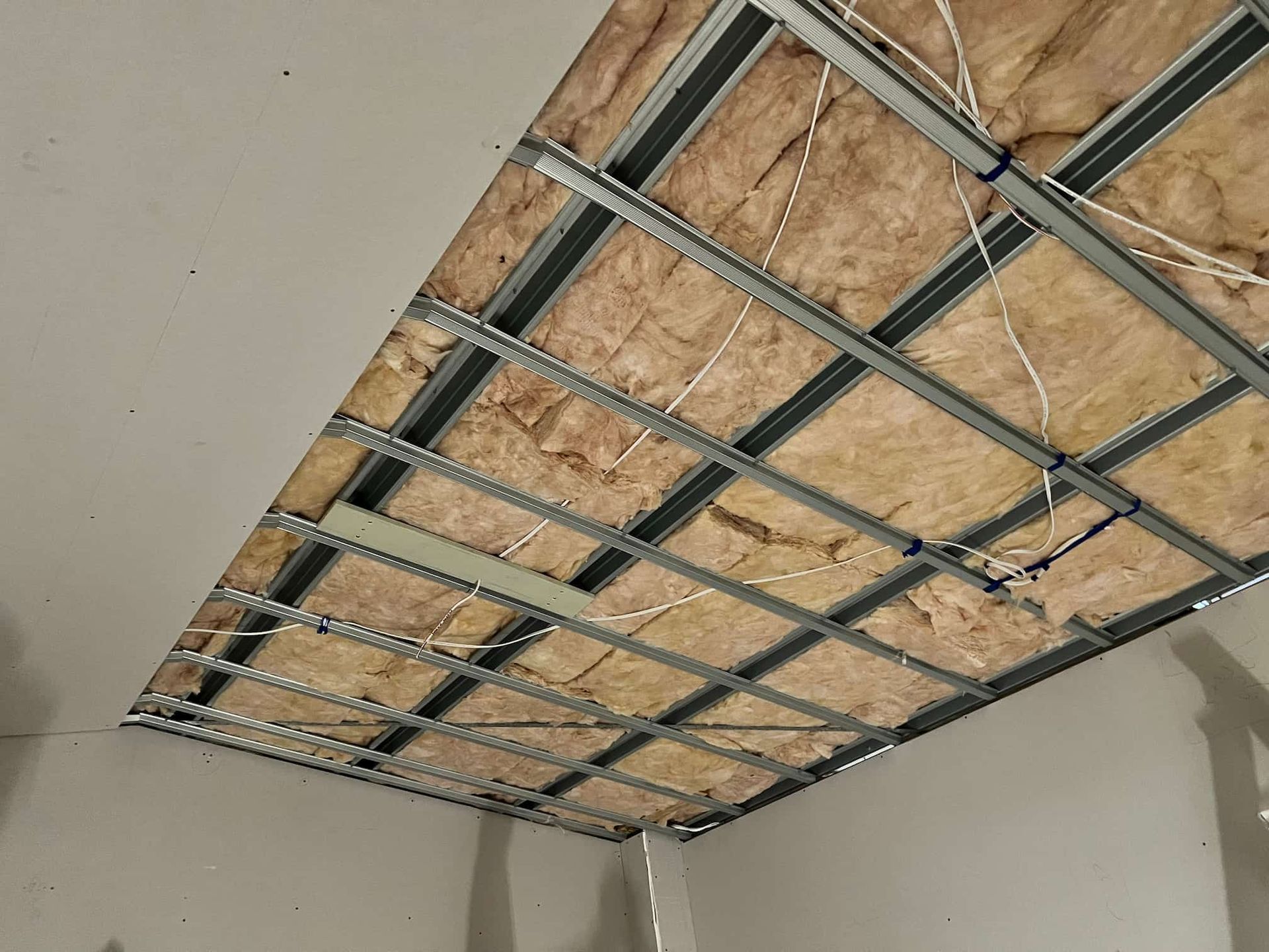 A Room With a Ceiling That is Being Built and Insulated — Poljak Plasterers in Currajong, QLD