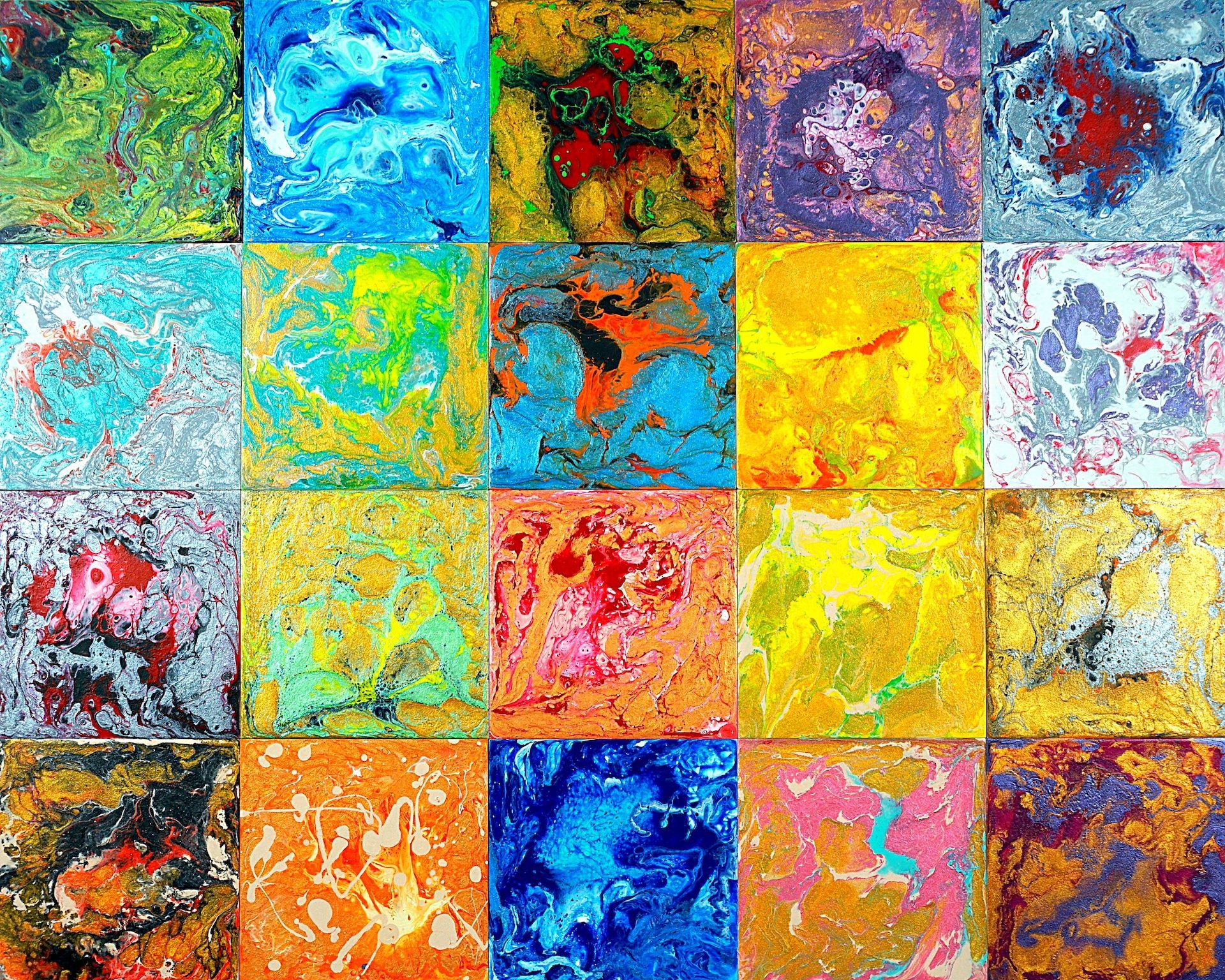 A bunch of colorful paintings on a wall