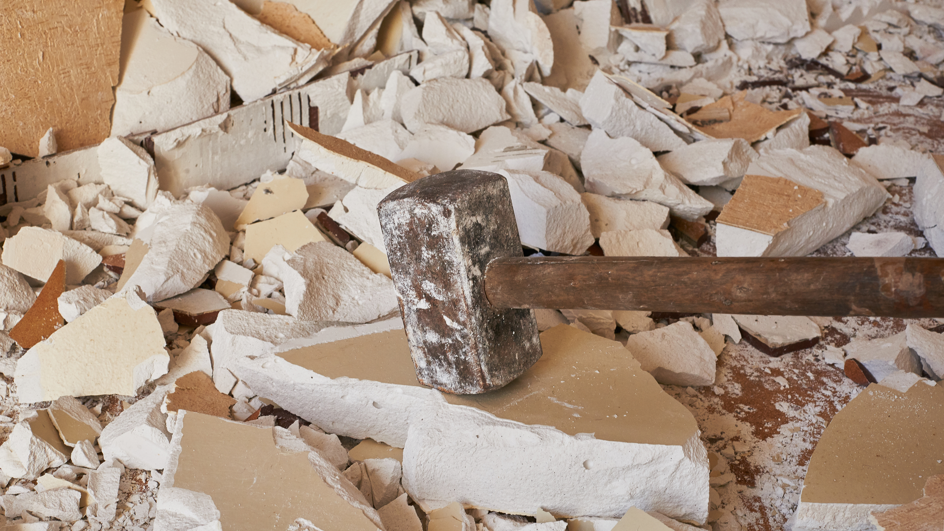 mixed stone material and concrete representing demolition debris