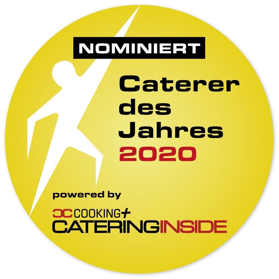 Goldenes, rundes Logo mit der Aufschrift Caterer des Jahres 2020
