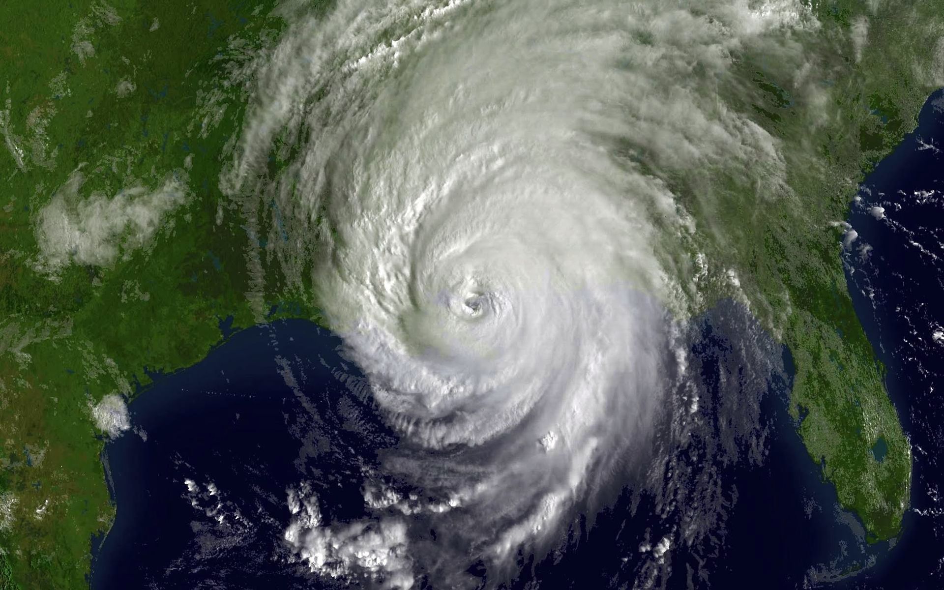 An aerial view of a hurricane in the middle of the ocean.