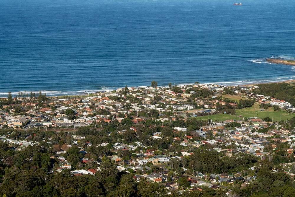 An Aerial View of a City Next to the Ocean — Fix-It Automotive in Unanderra, NSW