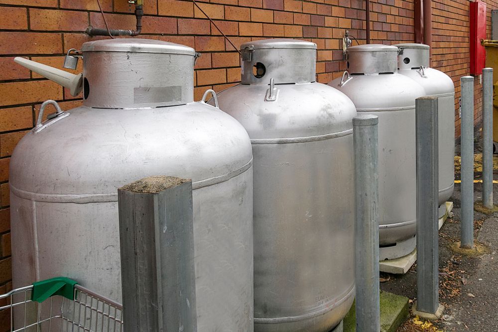 Braided Metal Hose Covered in Soapy Bubbles — Expert Plumbing & Solar Services Bathurst in Kelso, NSW