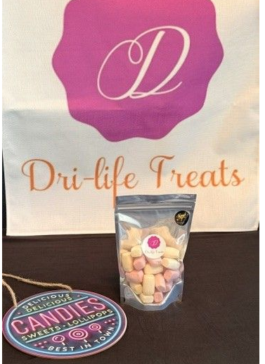 Dri-Life Treats logo with a pouch of candies and a round candy tin on a white background
