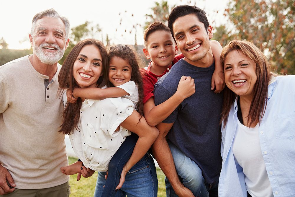 Multi Generational Hispanic family together during the day