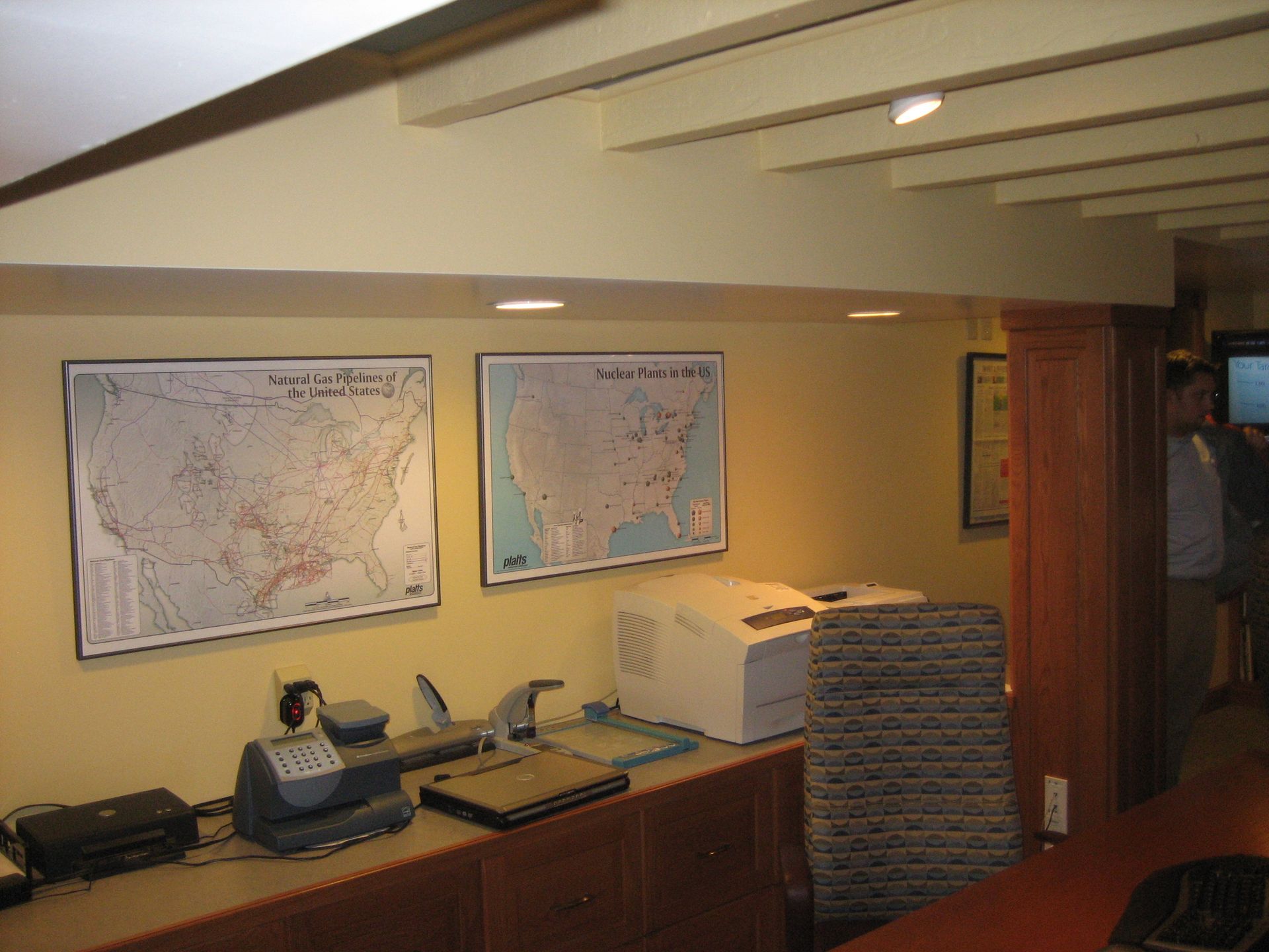 A map of the united states hangs on a wall