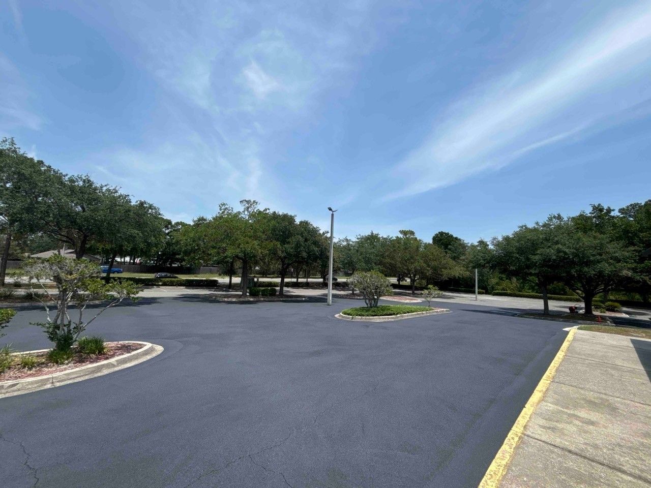 Brush Sealing Asphalt Paving — Jacksonville, FL — Pro Sealed Asphalt Inc. Brush Sealing Asphalt Paving — Jacksonville, FL — Pro Sealed Asphalt Inc.