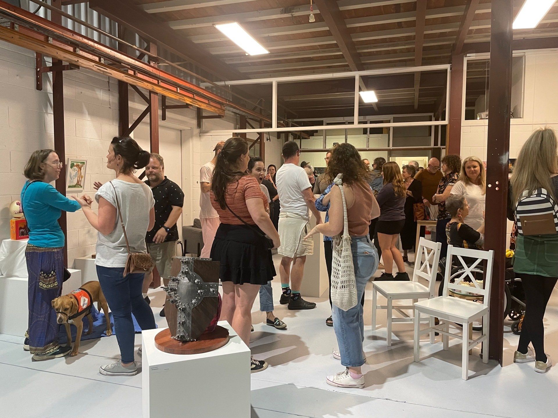 Art-goers at opening night event at CommunARTy group exhibition 'Life in Art', KEPK, Yeerongpilly