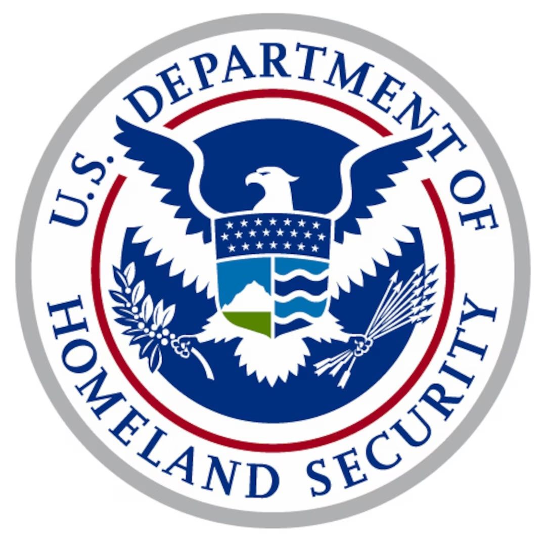 U.S. Department of Homeland Security seal with blue eagle emblem and circular text